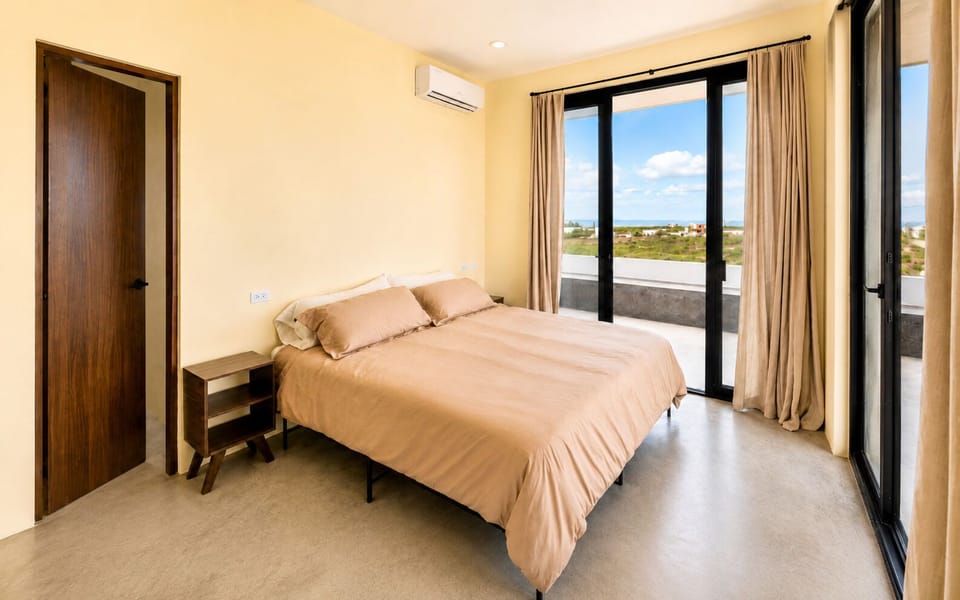 Upstairs king bedroom with ocean view