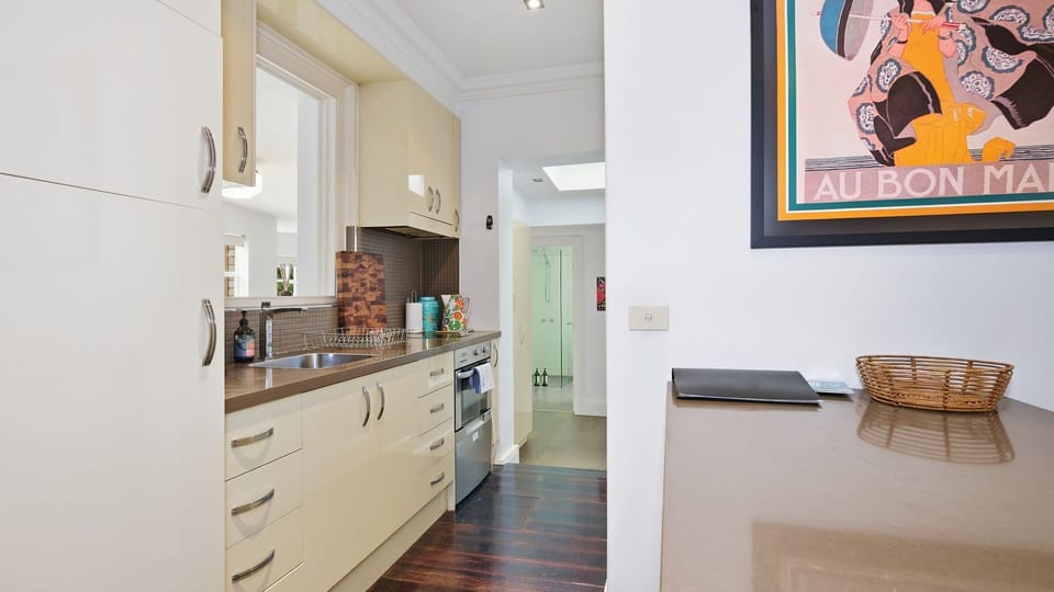 Clean and well-equipped kitchen counter setup.