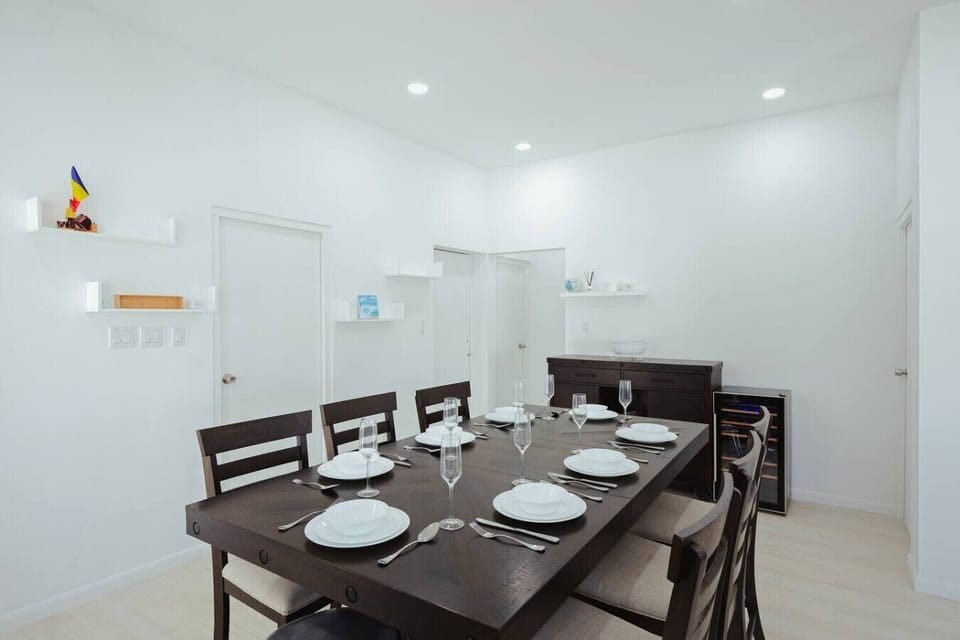 Spacious dining room with seating for eight, giving everyone a comfortable spot for meals together.