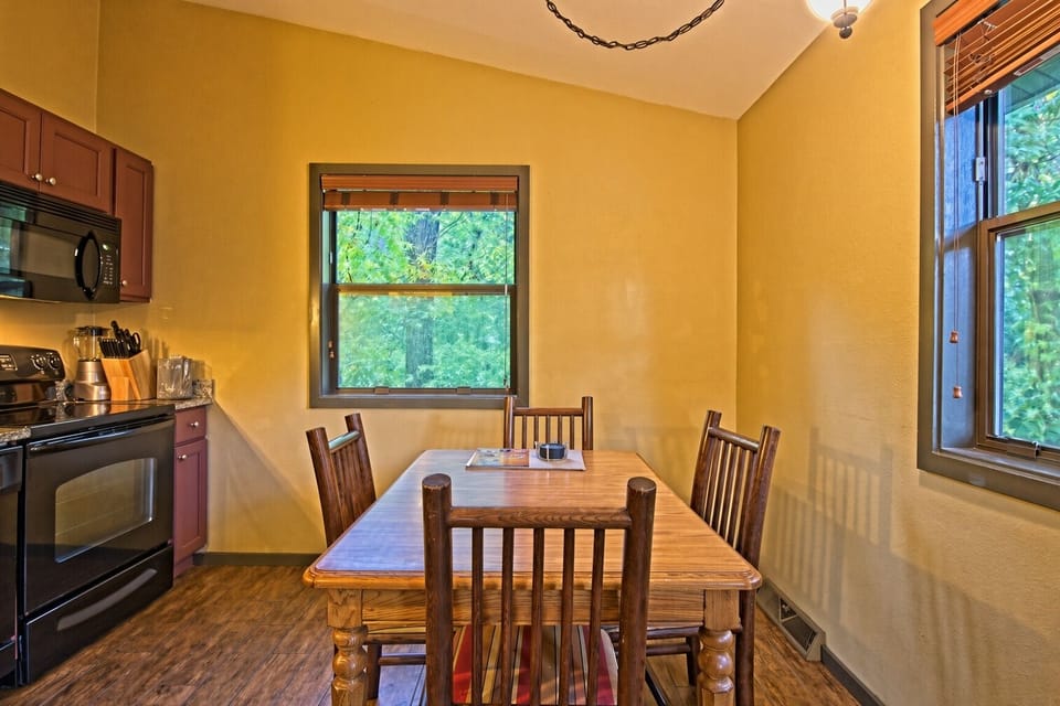 Dining Area • Wood Table with Kitchen Views