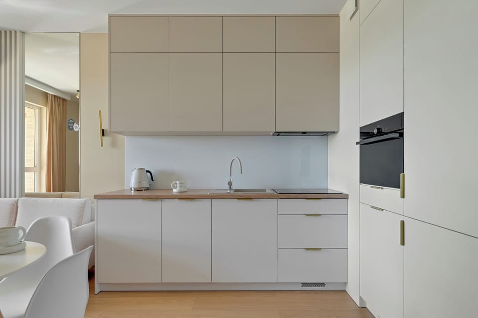 Superior Apartment, Balcony, Courtyard View | Private kitchenette | Coffee/tea maker, electric kettle, toaster, highchair