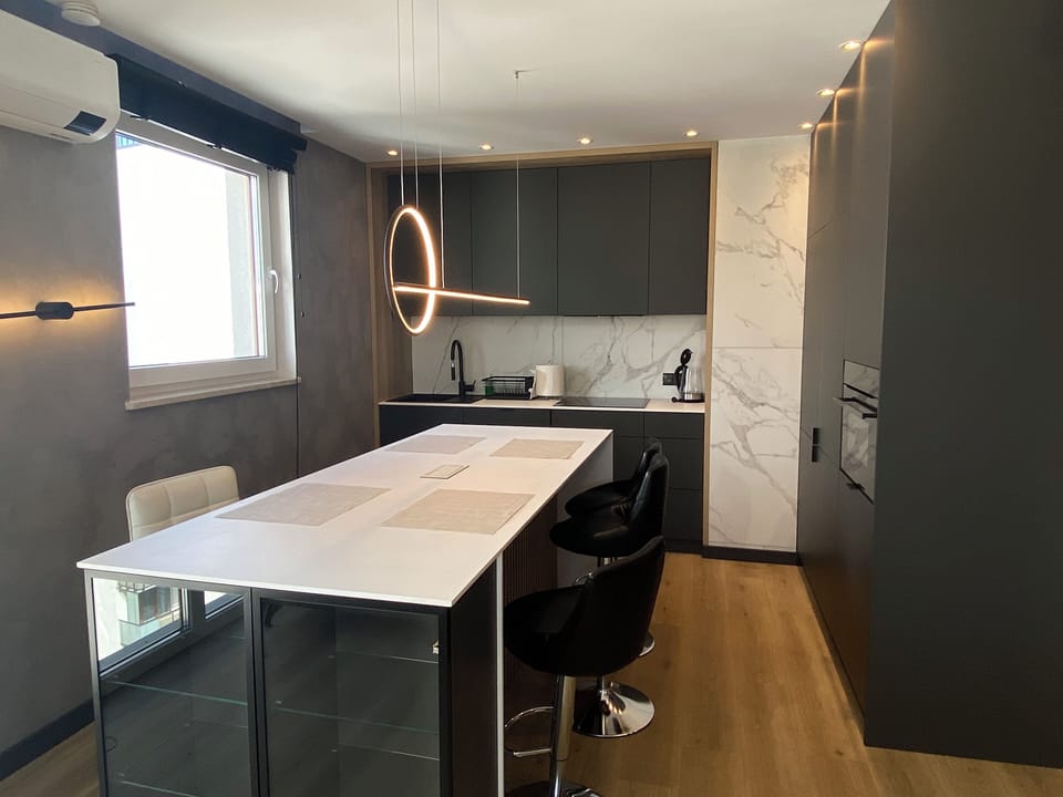 Superior Apartment, Balcony, Courtyard View | Private kitchenette | Toaster, highchair, paper towels, dining table