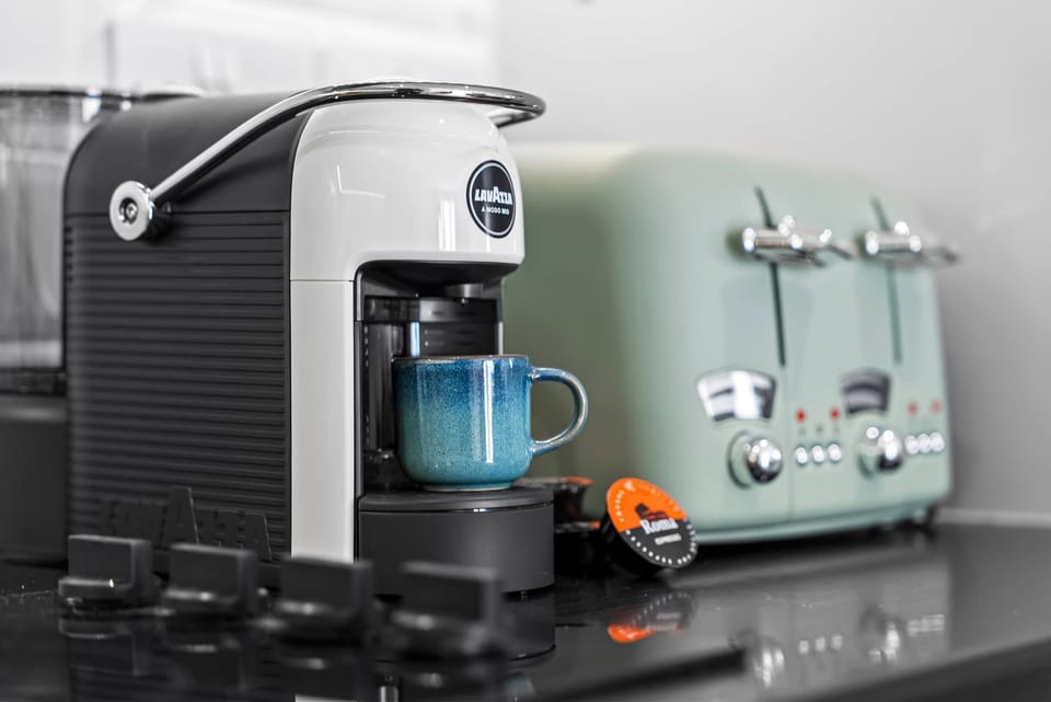 The fully equipped kitchen at Blue Puffin Stays make it easy to enjoy a home-cooked meal and coffee facilities.
