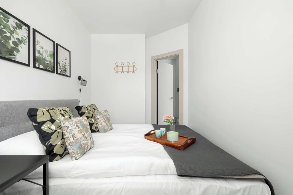 The bedroom features a luxurious double bed for a restful night's sleep. 
