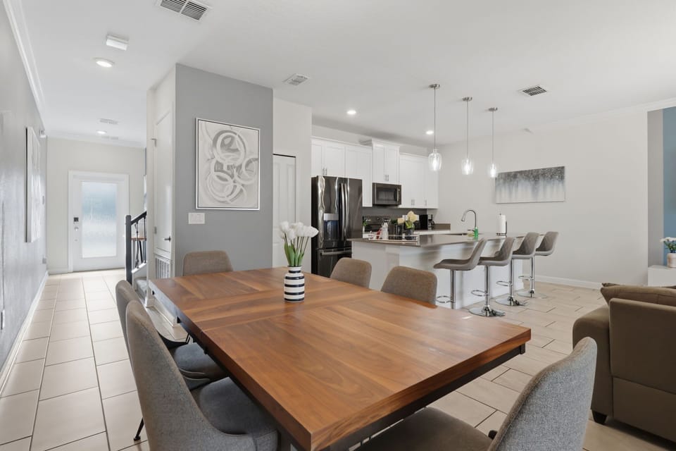 Comfortable dining space for family meals, game nights, or an easy takeout night after the parks.