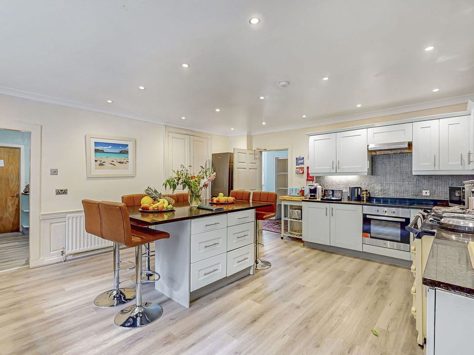 Furniture, Interior Design, Flooring, Floor, Wood, Ceiling, Kitchen, Cabinetry, Lighting, Countertop
