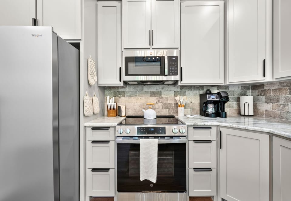 Fully equipped with stainless steel appliances and plenty of workspace, the kitchen has everything you need for anything from quick snacks to a full dinner at the cabin.