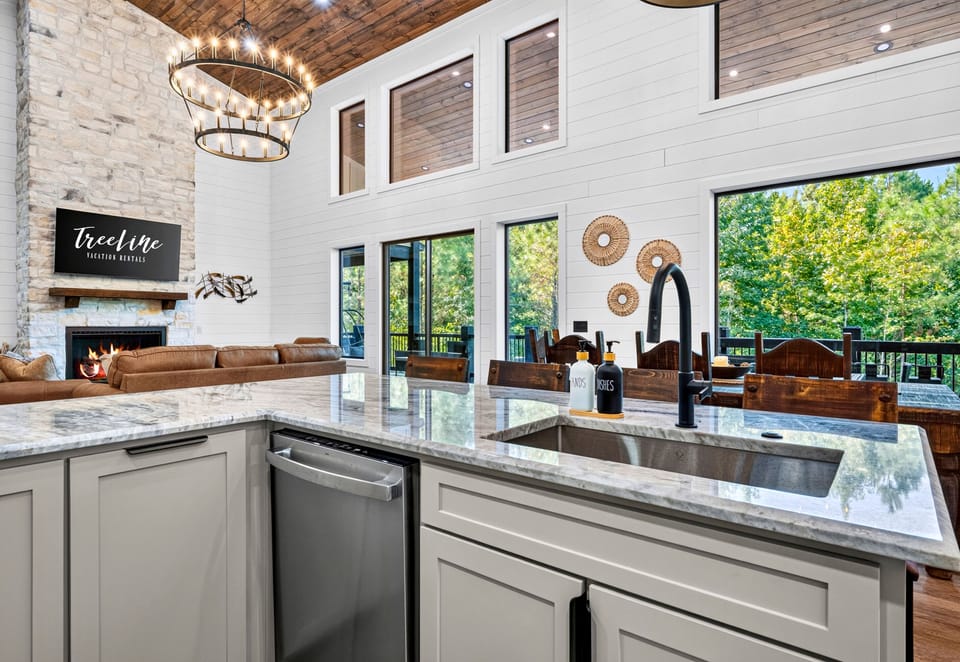 A long stretch of counter space provides plenty of room for meal prep while the open design lets you stay part of the conversation in the adjoining living area.