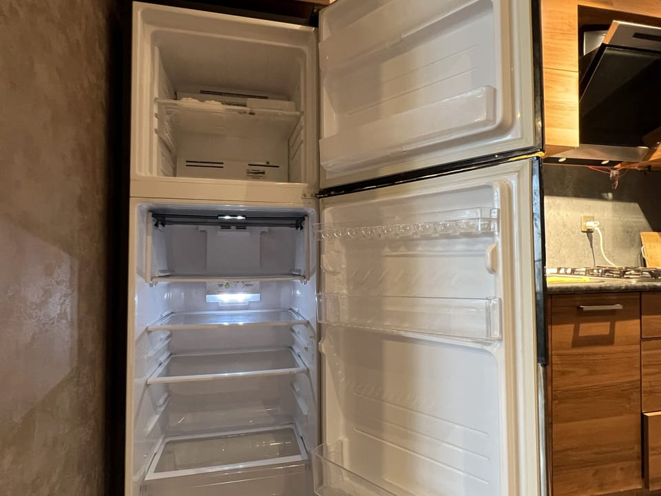 Full-size refrigerator and freezer interior.