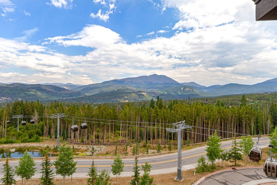 This property is situated in a stunning mountain resort area, surrounded by natural landscapes, forests, and accessible gondola lifts offering scenic transportation through the peaks.