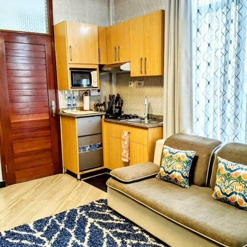 Kitchen with necessary amenities.