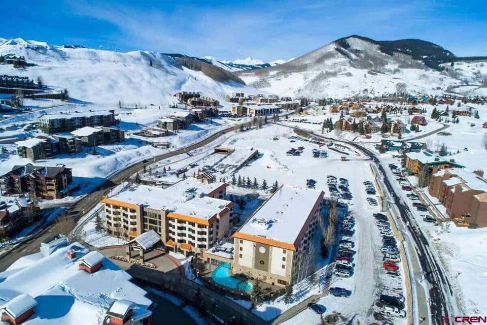 【Aerial — Winter】 The Grand Lodge sits closest to the Red Lady Express base