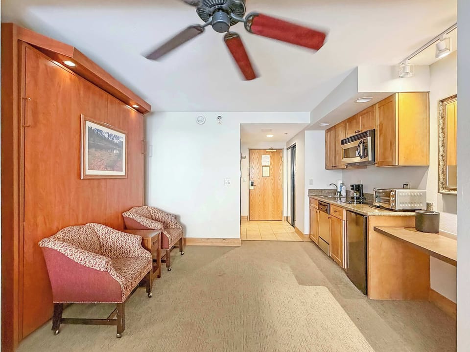 King Murphy bed and Kitchenette | Listed with @BookTraverse
