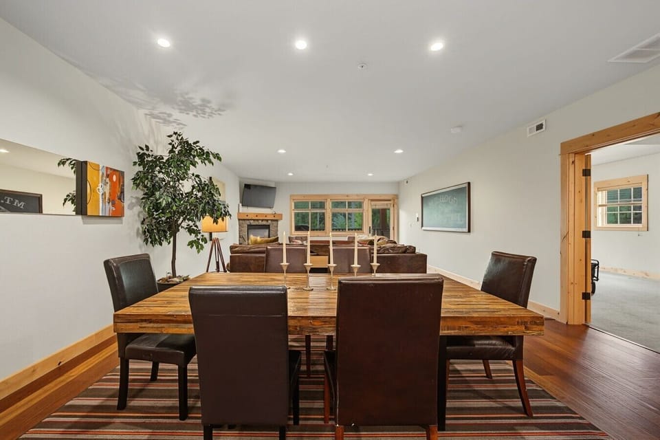 dining room with entry door to primary king bedroom
