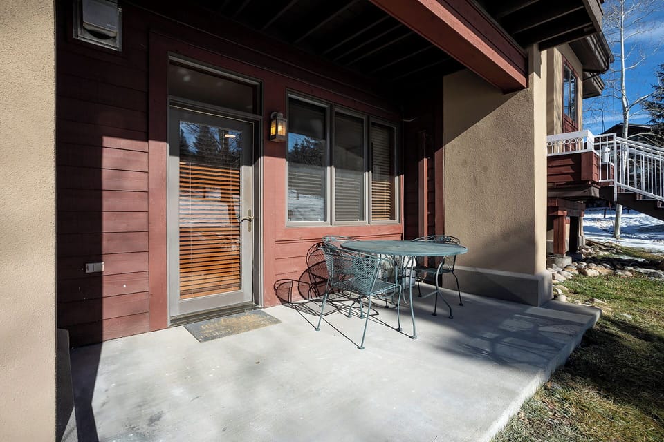 Your private patio offers a perfect spot to sip morning coffee or unwind after exploring, with mountain air and tranquil views just steps from your door.