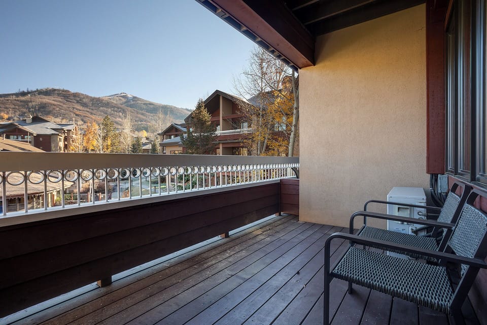 Step outside to your private deck and take in stunning mountain and neighborhood views framed by autumn foliage—perfect for morning coffee or evening relaxation in the fresh alpine air.
