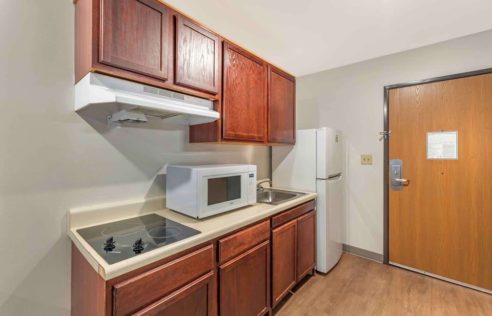 Room, 2 Queen Beds, Non Smoking, Kitchen | Private kitchenette | Full-size fridge, microwave, stovetop, freezer