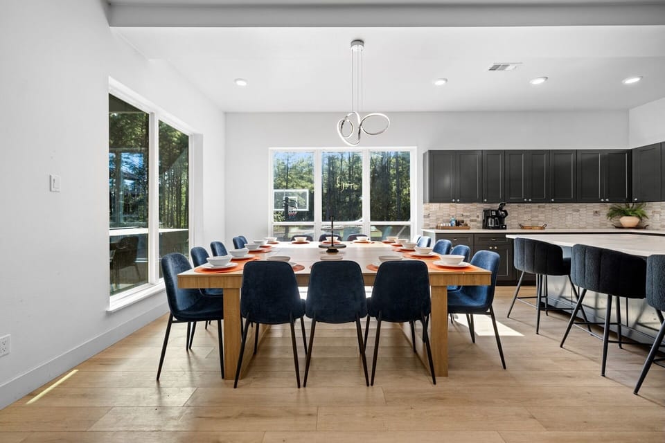 Between the extra large table and counter stools, everyone can eat together