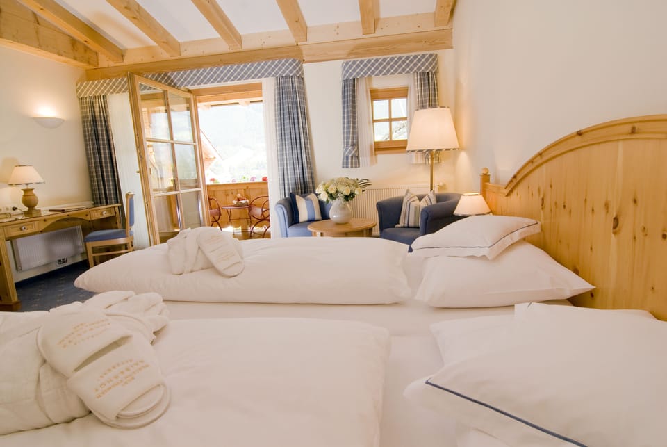 Premium bedding, down comforters, pillowtop beds, minibar