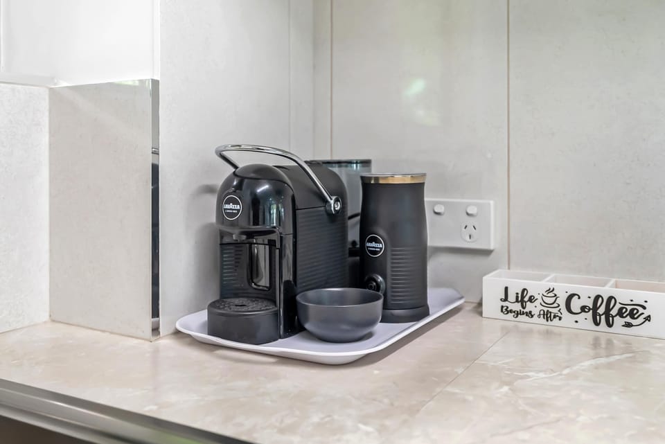 Start each day in the kitchen with a fresh Nespresso coffee before heading out.