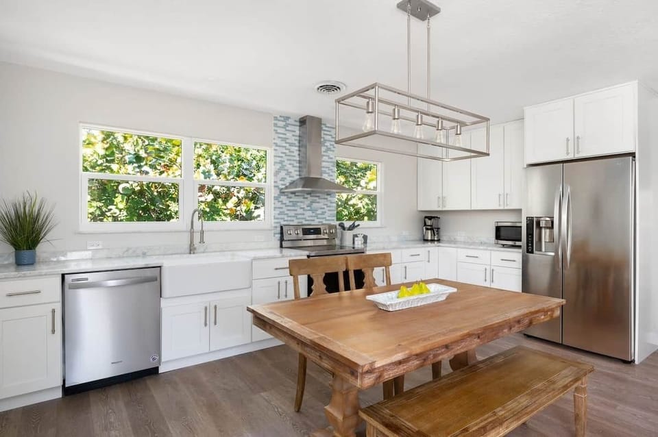 Large and very well stocked combined kitchen and dining room. New appliances and granite counters.