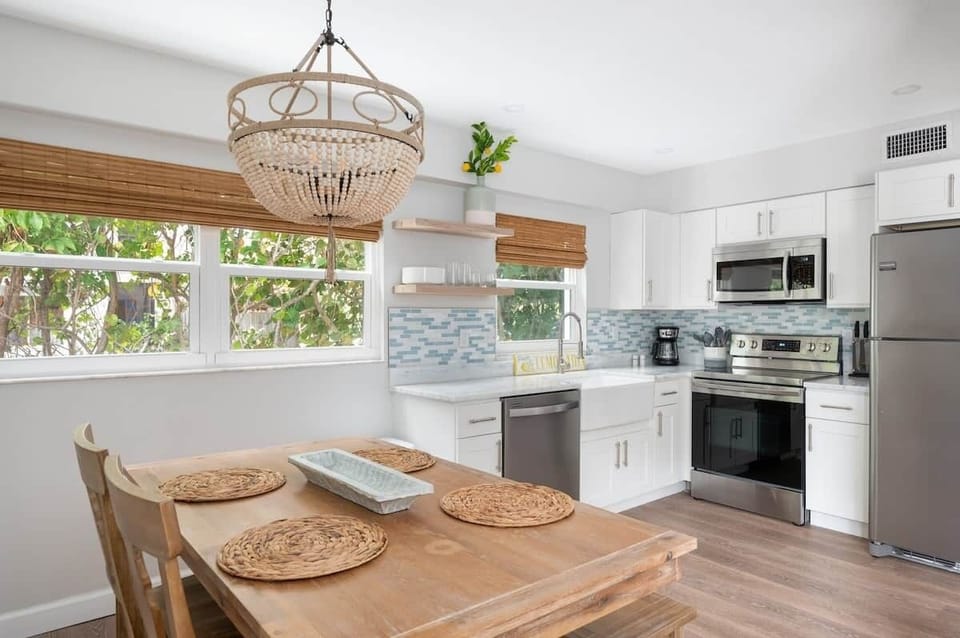 Modern kitchen with new appliances and granite counters