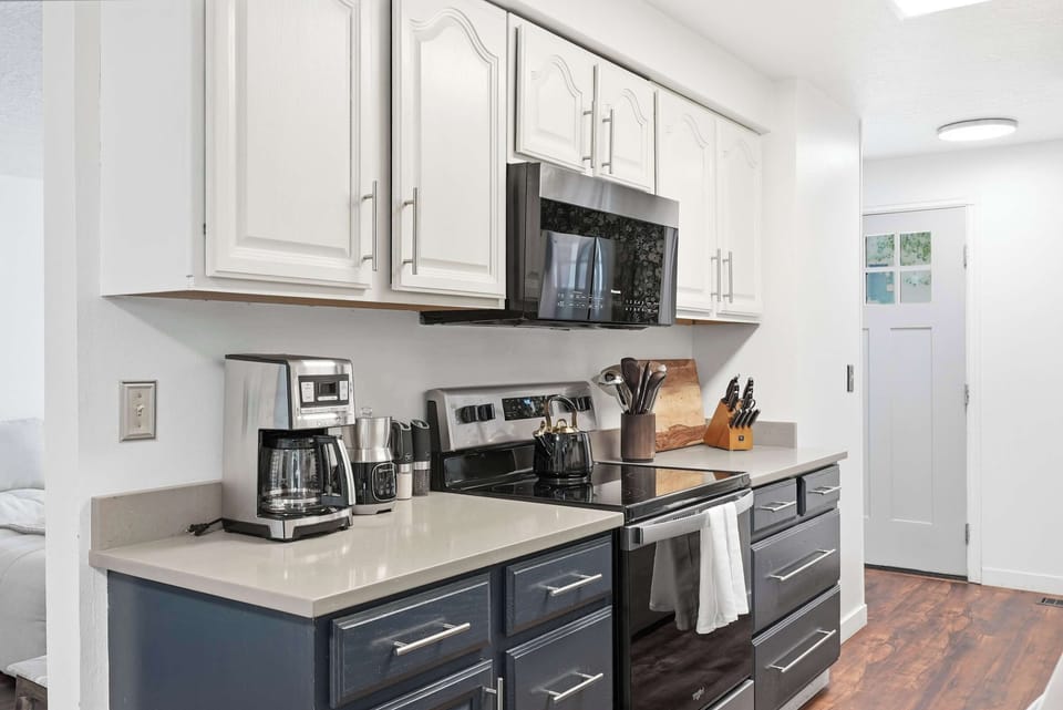 The galley-style kitchen is well equipped for an unforgettable getaway​