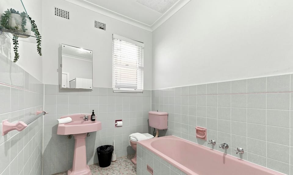 Relaxing bathroom with bathtub available