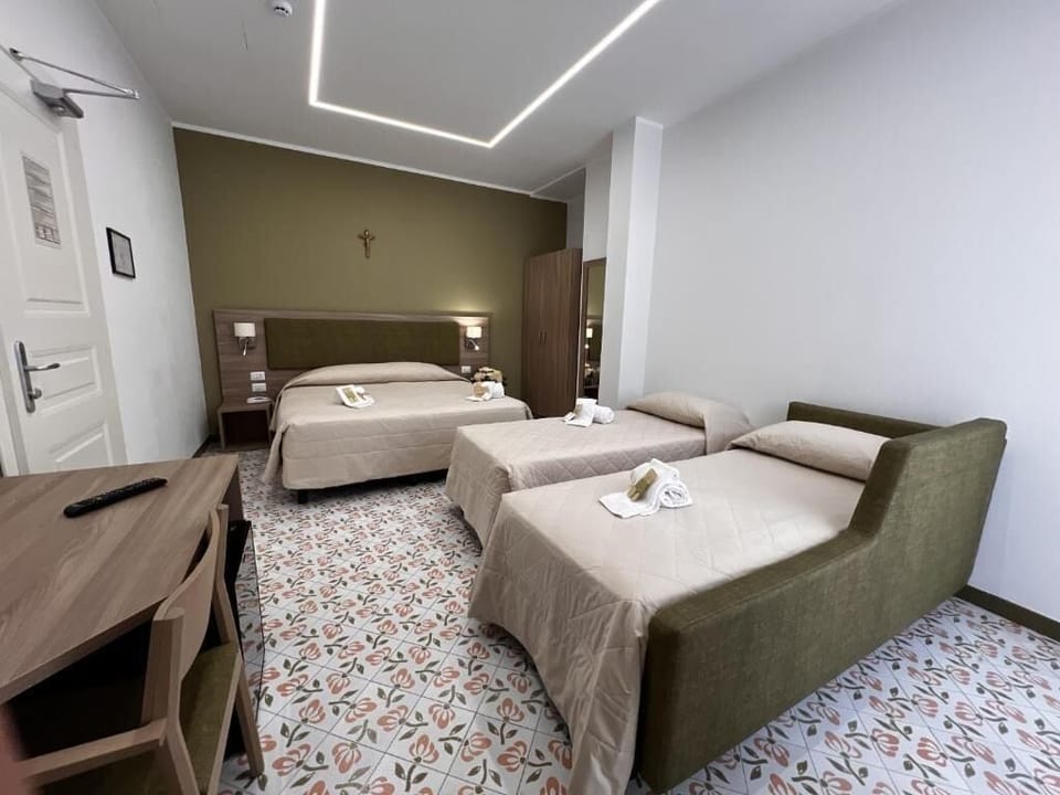 Quadruple Room, Balcony, Courtyard View | Desk, laptop workspace, iron/ironing board, WiFi (free)