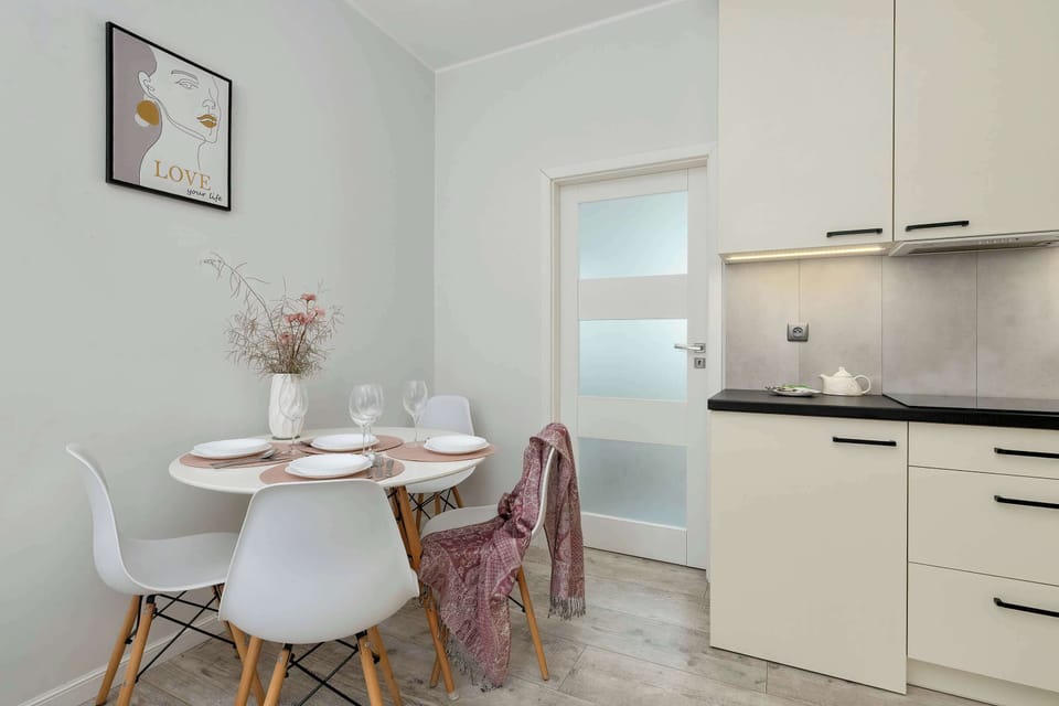 Cook and dine in style with the modern kitchenette and dining area.