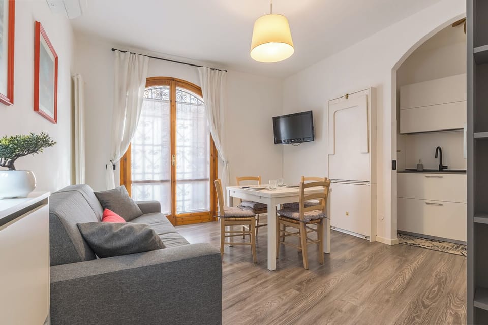 Apartment, 1 Bedroom, Balcony | Living area | 30-inch TV with satellite channels