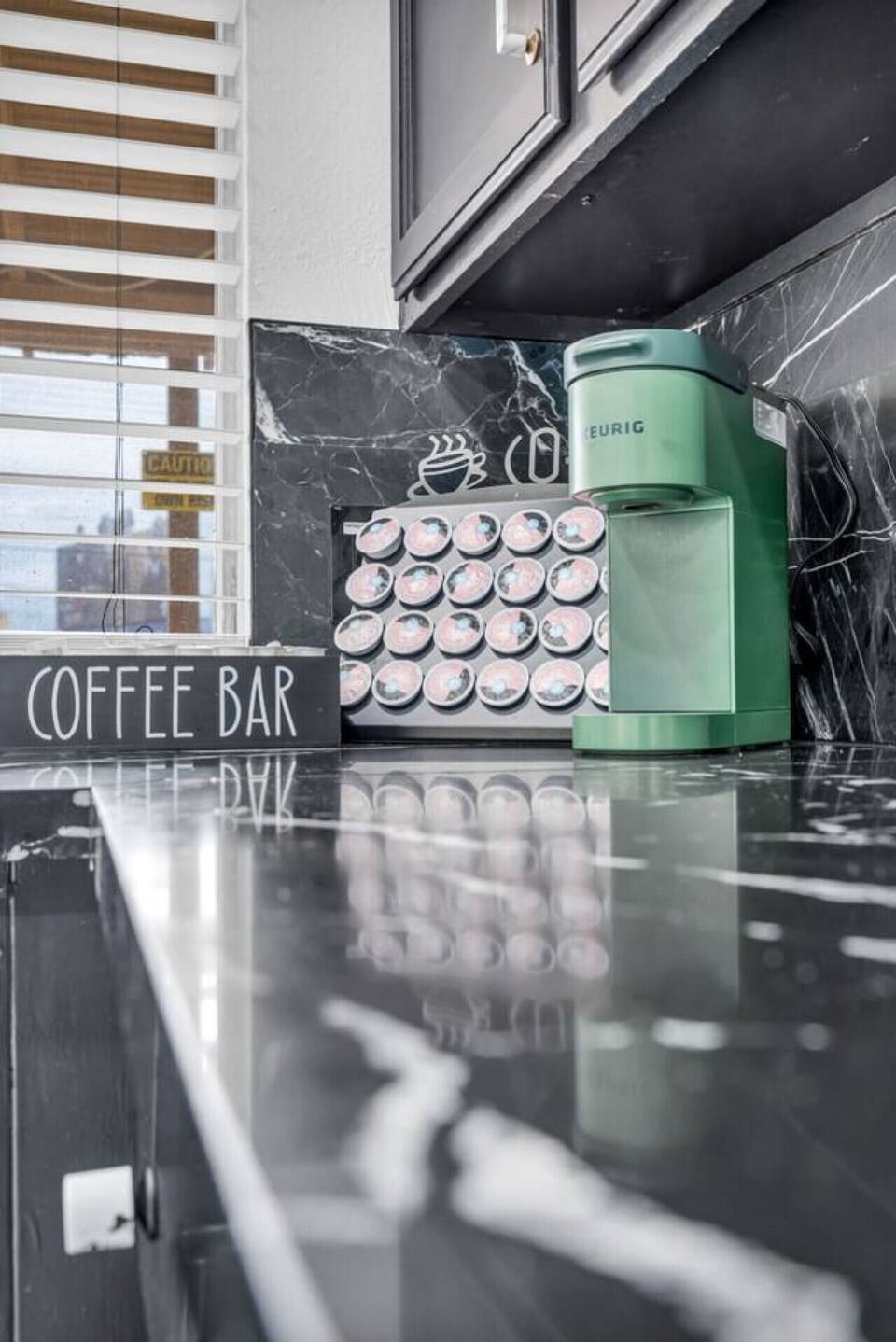 Jumpstart your day at the sleek coffee bar, complete with a stylish Keurig and a wide selection of pods to suit every taste.