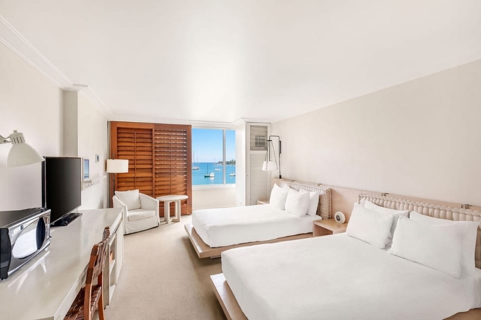 Guest Room • Two Double Beds + Desk
