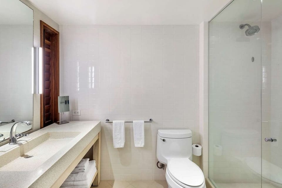 Bathroom • Vanity, Glass Walk-in Shower & Modern Fixtures