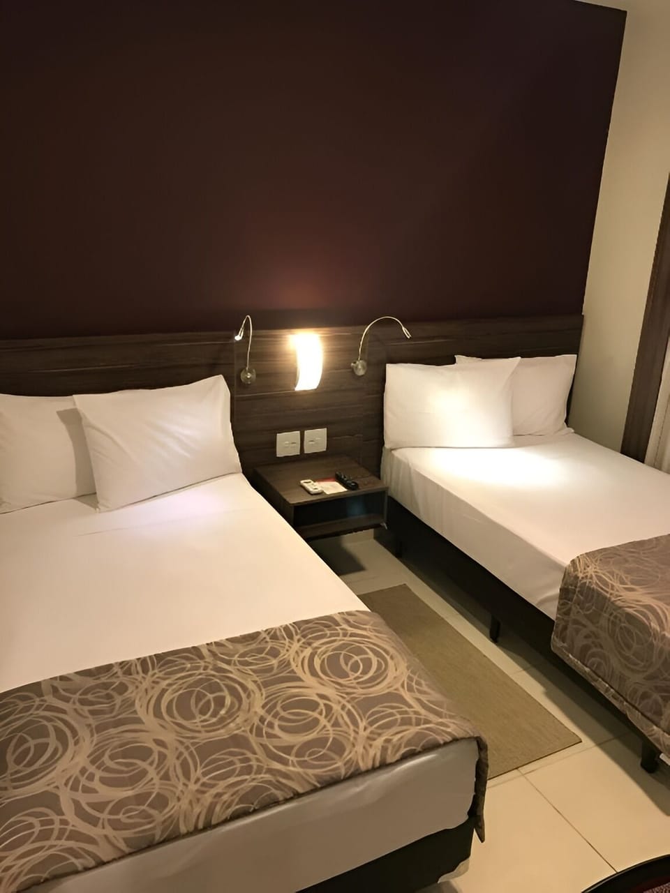 Rest easy in twin beds with cozy, hotel-style comfort.