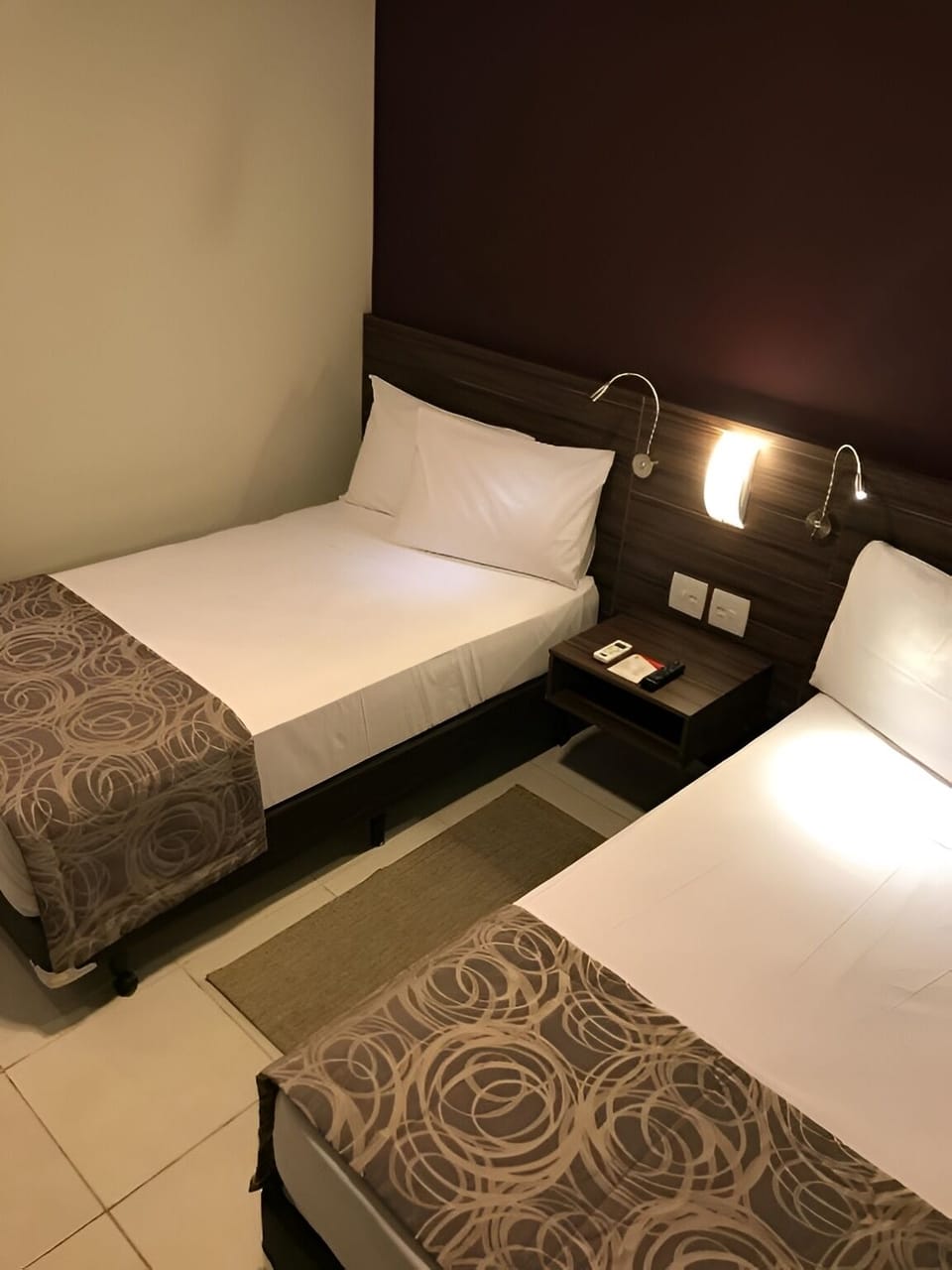 Unwind in crisp twin beds after a day exploring
