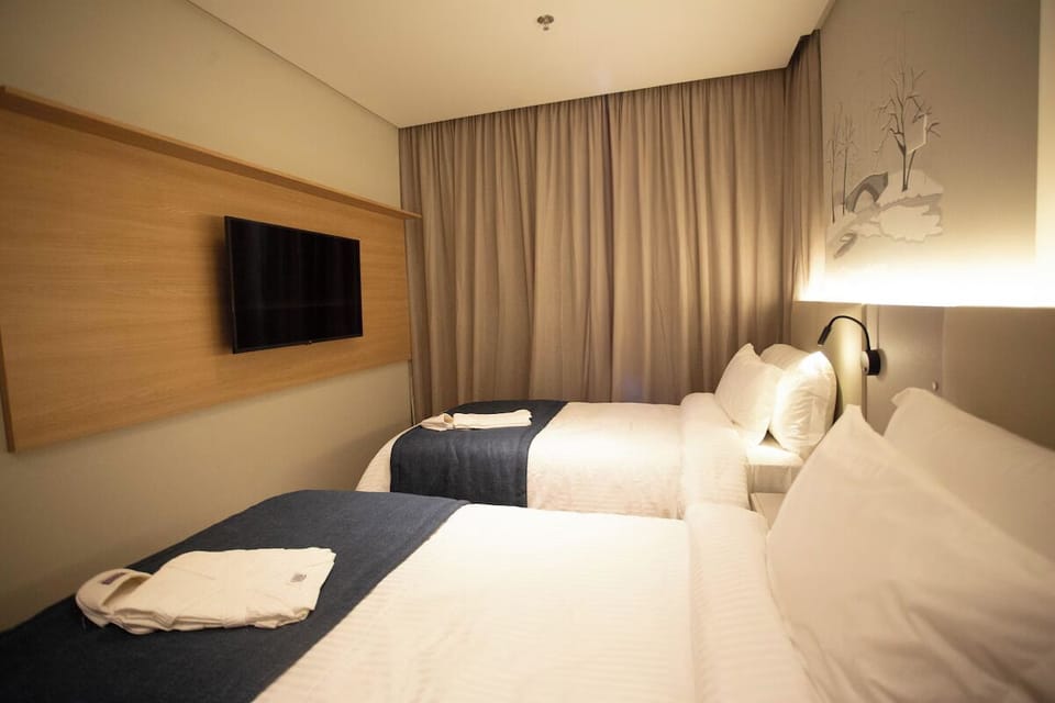 Relax with your favorite shows from the comfort of bed.