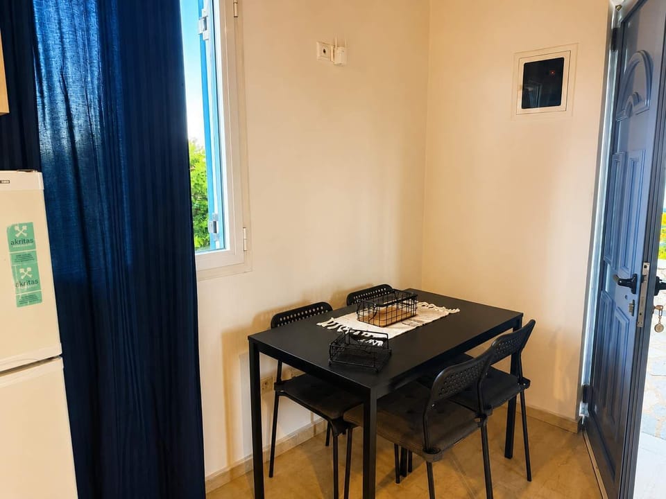 Cozy indoor dining area, ideal for enjoying breakfast or a quiet meal at home.