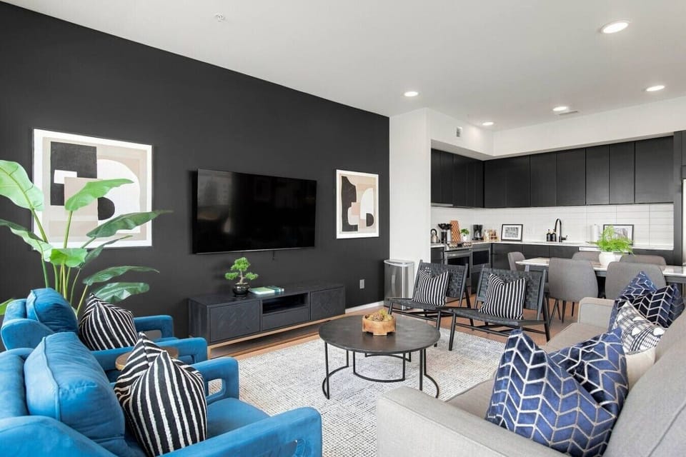 Spacious living room with queen pull-out couch, stunning riverfront views, and a Smart TV for your entertainment. Enjoy your morning coffee on our private patio that overlooks Cumberland river.