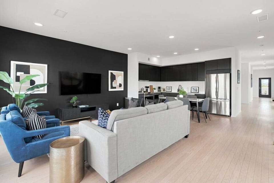 Spacious living room with queen pull-out couch, stunning riverfront views, and a Smart TV for your entertainment. Enjoy your morning coffee on our private patio that overlooks Cumberland river.