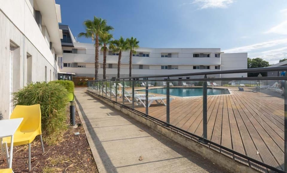 Take your coffee next to the pool