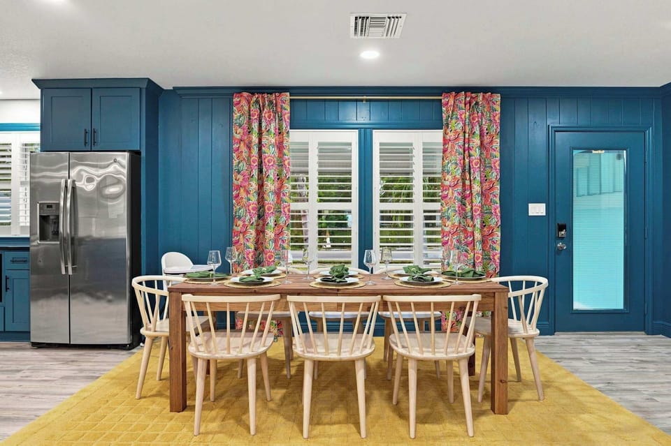 Gather the whole crew around a table big enough for everyone, with the kitchen close enough to keep the conversation going while dinner comes together.