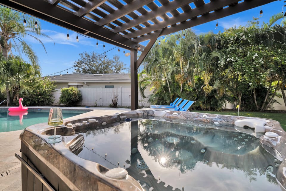 Private hot tub, string lights overhead promising a romantic day