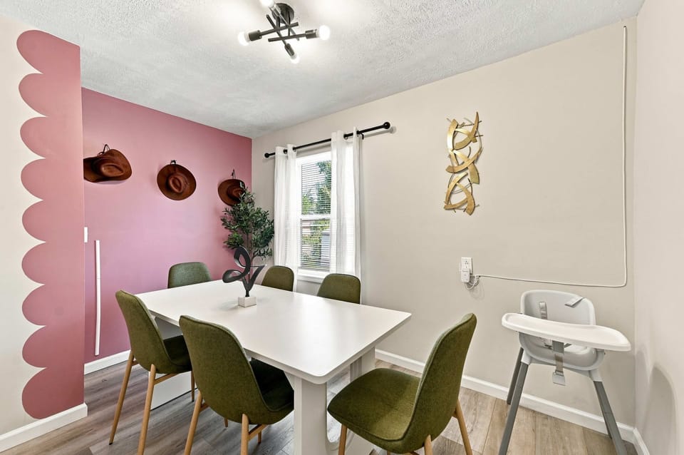 Share meals, plan the day, or break out the cards around the six-person dining table