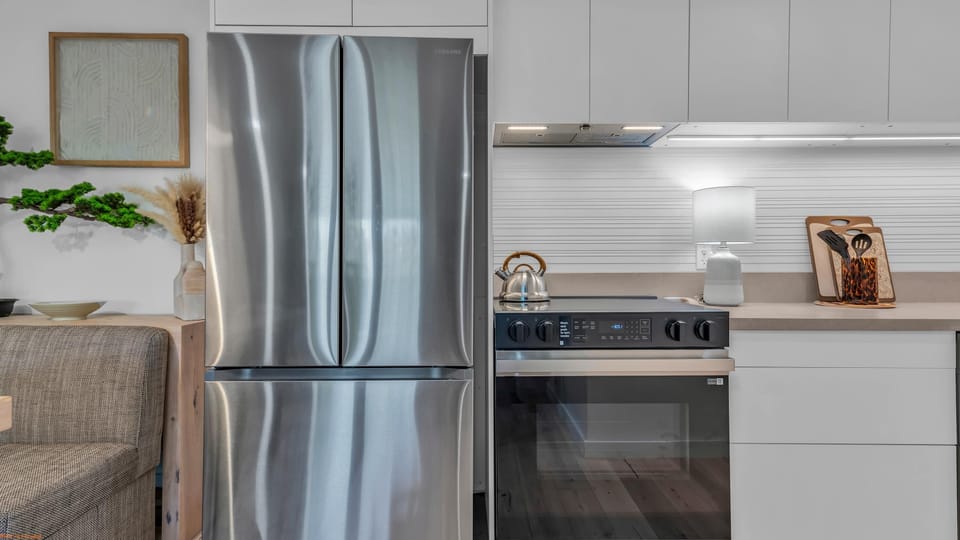 The sleek, eat-in kitchen with dining space for 4 is well equipped for an unforgettable getaway​