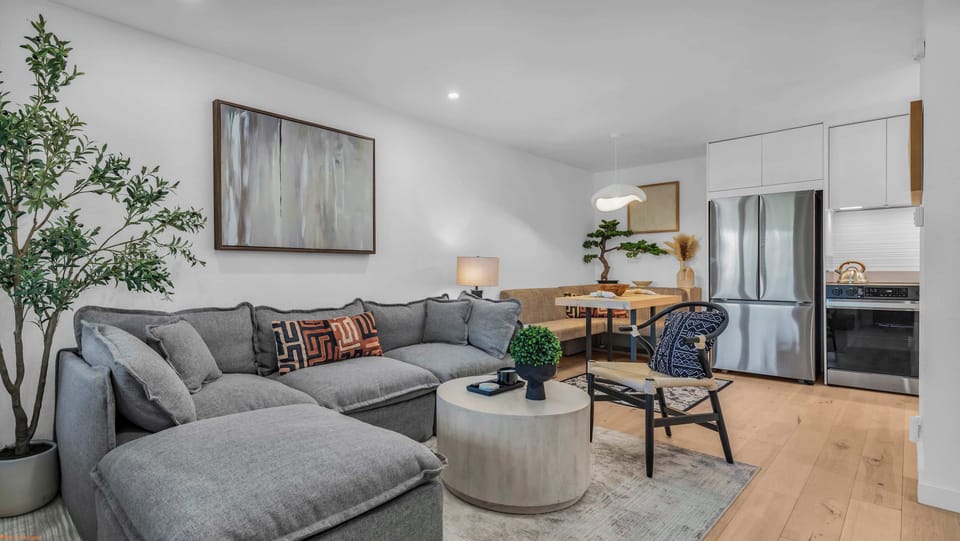 Curl up in the open living room & stream your favorites on the smart TV​