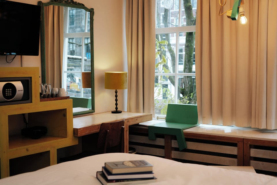 Double Room, 1 King Bed, Canal View | Free minibar, in-room safe, individually decorated