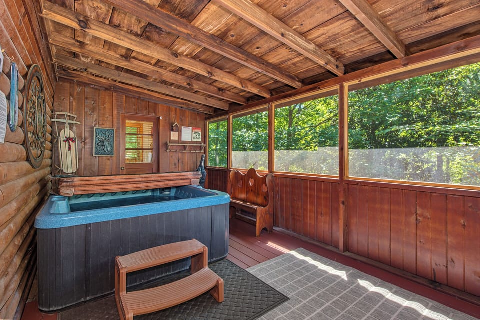 Unwind in your own private hot tub surrounded by warm wood walls and sunlight streaming through large windows. Step in and let your cares melt away as you soak in tranquil comfort.
