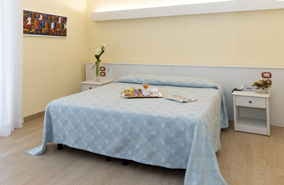 Double or Twin Room, Balcony | In-room safe, desk, free WiFi, bed sheets