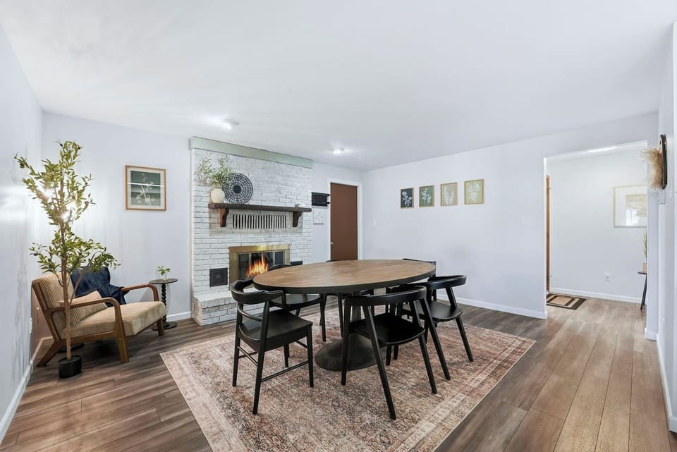 The open layout connects our dining space to the rest of the main level, making it easy to chat with the cook from the dinner table.